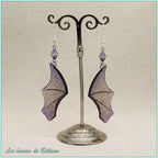 Boucles d'oreilles ailes de dragon en résine violette pailletée, faites main