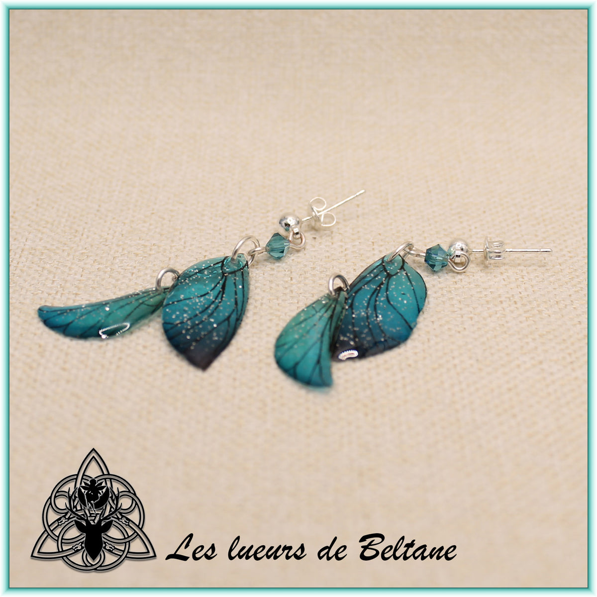 Boucles d'oreilles ailes de fée Aileen pailletées, coloris bleu turquoise, autre vue