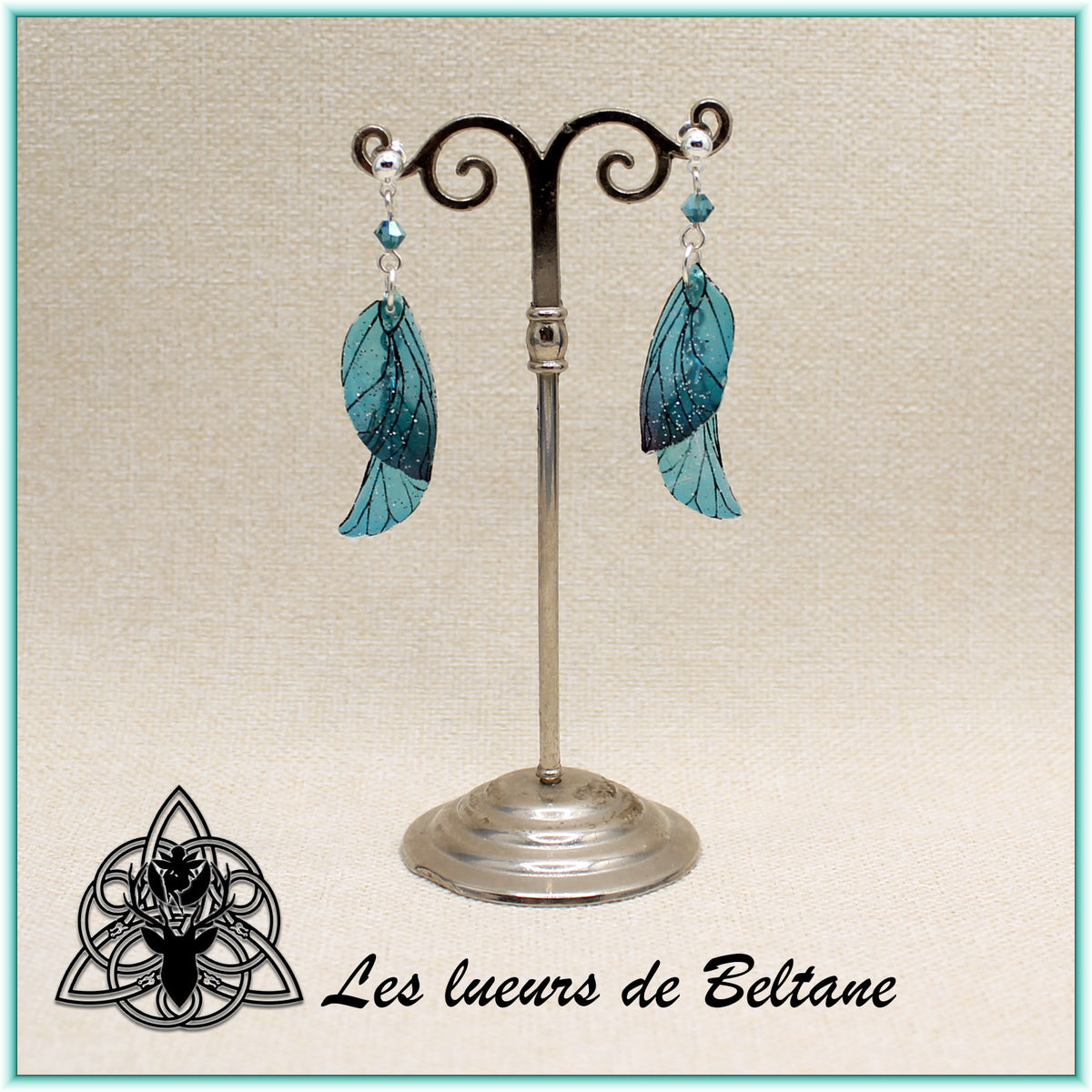 Boucles d'oreilles ailes de fée Aileen pailletées, coloris bleu turquoise