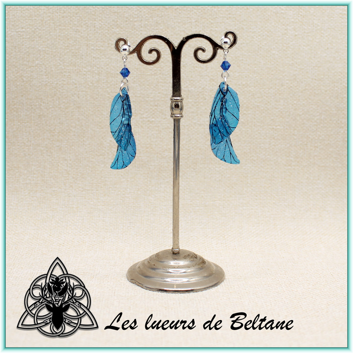 Boucles d'oreilles ailes de fée Aileen pailletées, coloris bleu