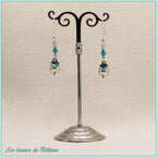 Boucles d'oreilles Branwen, petit chaudron argenté et perle en cristal bleu turquoise