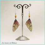 Boucles d'oreilles Oona pailletées, aile de fée en résine orange