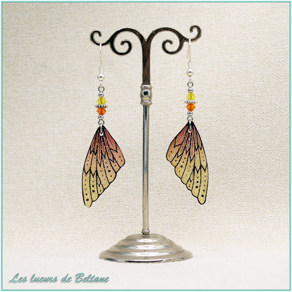 Boucles d'oreilles Oona pailletées, aile de fée en résine orange
